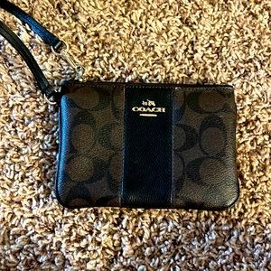 Dark brown coach wristlet